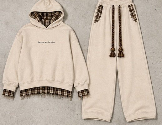 Monaco Set in beige: hoodie and wide-leg trousers on a stone background #color-beige