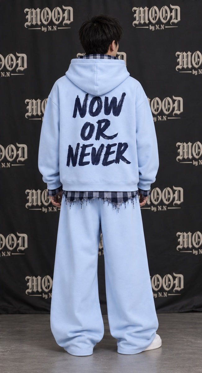 Monaco Set in blue on a model, back view with NOW OR NEVER print #color-blue