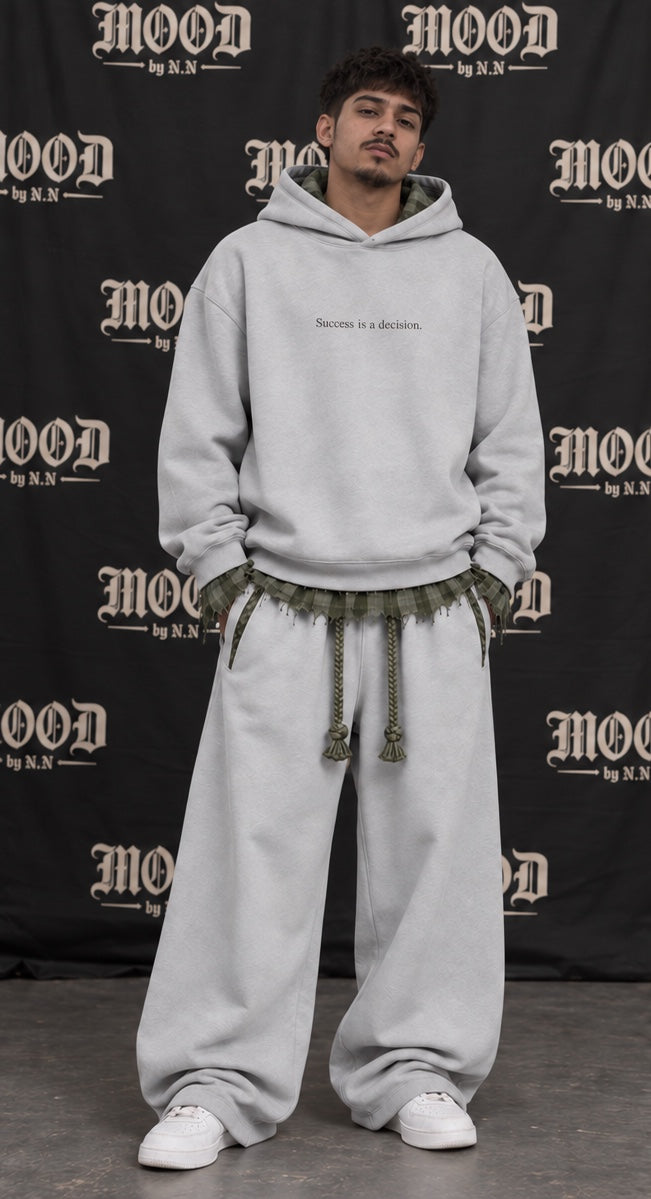 Monaco Set in gray on a model, front view: oversized hoodie with a frayed plaid layer and wide-leg trousers #color-gray