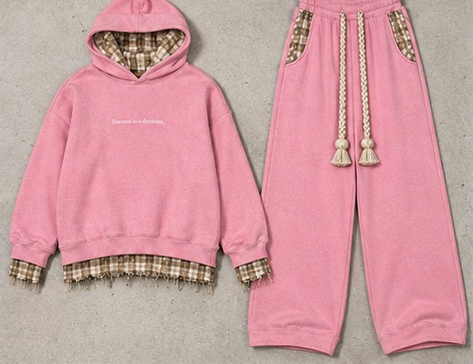 Monaco Set in pink: hoodie and wide-leg trousers on a stone background #color-pink